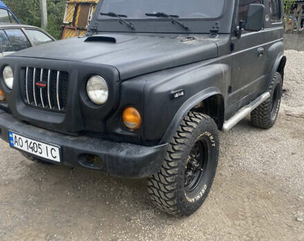 Черный Киа Ретона, объемом двигателя 2 л и пробегом 80 тыс. км за 6500 $, фото 1 на Automoto.ua