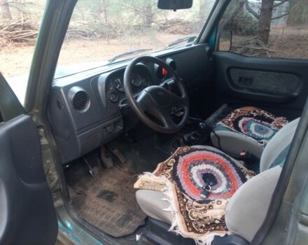 Зелений Кіа Ретона, об'ємом двигуна 2 л та пробігом 235 тис. км за 2500 $, фото 4 на Automoto.ua