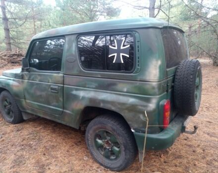 Зелений Кіа Ретона, об'ємом двигуна 2 л та пробігом 235 тис. км за 2500 $, фото 3 на Automoto.ua