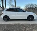 Белый Киа Рио, объемом двигателя 1.4 л и пробегом 152 тыс. км за 4500 $, фото 4 на Automoto.ua
