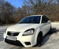 Білий Кіа Ріо, об'ємом двигуна 1.4 л та пробігом 150 тис. км за 4700 $, фото 1 на Automoto.ua