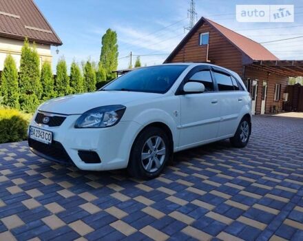 Белый Киа Рио, объемом двигателя 1.4 л и пробегом 205 тыс. км за 5400 $, фото 8 на Automoto.ua