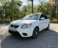 Белый Киа Рио, объемом двигателя 1.4 л и пробегом 199 тыс. км за 5700 $, фото 1 на Automoto.ua