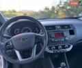 Білий Кіа Ріо, об'ємом двигуна 1.25 л та пробігом 128 тис. км за 6500 $, фото 11 на Automoto.ua