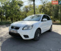 Белый Киа Рио, объемом двигателя 1.4 л и пробегом 199 тыс. км за 4700 $, фото 1 на Automoto.ua