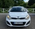 Белый Киа Рио, объемом двигателя 1.1 л и пробегом 212 тыс. км за 5800 $, фото 1 на Automoto.ua
