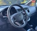 Білий Кіа Ріо, об'ємом двигуна 1.25 л та пробігом 128 тис. км за 6500 $, фото 9 на Automoto.ua