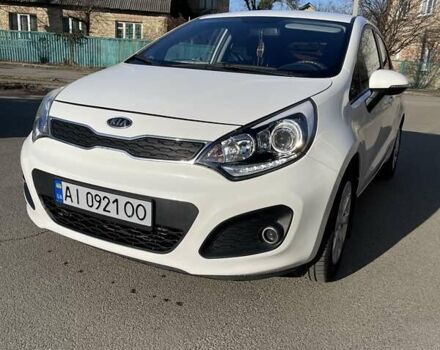 Белый Киа Рио, объемом двигателя 1.12 л и пробегом 203 тыс. км за 6300 $, фото 2 на Automoto.ua