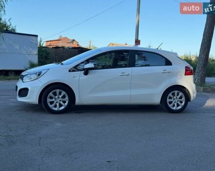 Білий Кіа Ріо, об'ємом двигуна 1.25 л та пробігом 128 тис. км за 6500 $, фото 3 на Automoto.ua