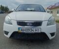 Білий Кіа Ріо, об'ємом двигуна 1.4 л та пробігом 120 тис. км за 6100 $, фото 1 на Automoto.ua