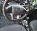 Білий Кіа Ріо, об'ємом двигуна 1.6 л та пробігом 185 тис. км за 7899 $, фото 23 на Automoto.ua