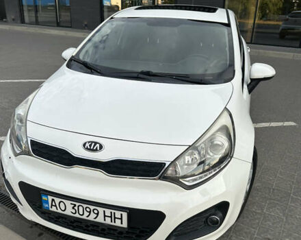 Білий Кіа Ріо, об'ємом двигуна 1.1 л та пробігом 330 тис. км за 6900 $, фото 1 на Automoto.ua