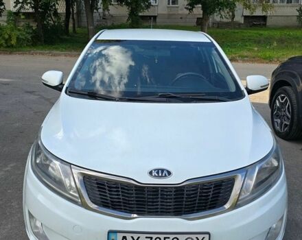 Белый Киа Рио, объемом двигателя 1.6 л и пробегом 299 тыс. км за 5800 $, фото 1 на Automoto.ua