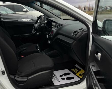 Білий Кіа Ріо, об'ємом двигуна 1.4 л та пробігом 200 тис. км за 6900 $, фото 13 на Automoto.ua