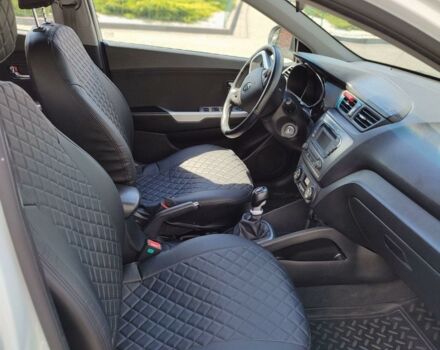Белый Киа Рио, объемом двигателя 1.6 л и пробегом 58 тыс. км за 10000 $, фото 9 на Automoto.ua