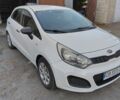 Белый Киа Рио, объемом двигателя 1.2 л и пробегом 203 тыс. км за 5600 $, фото 1 на Automoto.ua