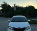 Білий Кіа Ріо, об'ємом двигуна 1.4 л та пробігом 330 тис. км за 6499 $, фото 1 на Automoto.ua