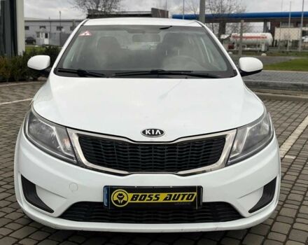 Білий Кіа Ріо, об'ємом двигуна 1.4 л та пробігом 200 тис. км за 6900 $, фото 1 на Automoto.ua
