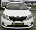 Білий Кіа Ріо, об'ємом двигуна 1.4 л та пробігом 200 тис. км за 6900 $, фото 1 на Automoto.ua