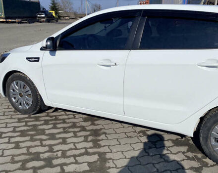 Білий Кіа Ріо, об'ємом двигуна 1.4 л та пробігом 101 тис. км за 7000 $, фото 6 на Automoto.ua