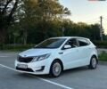 Білий Кіа Ріо, об'ємом двигуна 1.4 л та пробігом 330 тис. км за 3800 $, фото 7 на Automoto.ua