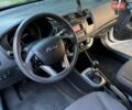 Белый Киа Рио, объемом двигателя 1.25 л и пробегом 144 тыс. км за 7000 $, фото 2 на Automoto.ua