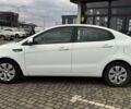 Білий Кіа Ріо, об'ємом двигуна 1.4 л та пробігом 200 тис. км за 6900 $, фото 3 на Automoto.ua