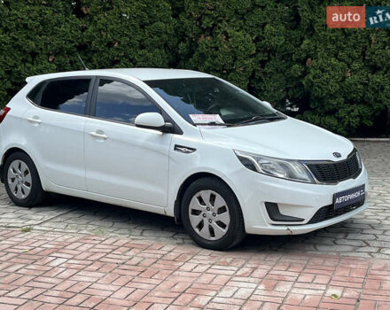 Белый Киа Рио, объемом двигателя 1.4 л и пробегом 279 тыс. км за 7200 $, фото 1 на Automoto.ua