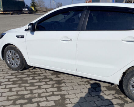 Білий Кіа Ріо, об'ємом двигуна 1.4 л та пробігом 103 тис. км за 6750 $, фото 4 на Automoto.ua