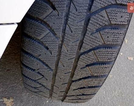 Белый Киа Рио, объемом двигателя 1.12 л и пробегом 250 тыс. км за 4400 $, фото 2 на Automoto.ua