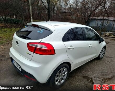 Белый Киа Рио, объемом двигателя 1.1 л и пробегом 155 тыс. км за 6200 $, фото 2 на Automoto.ua