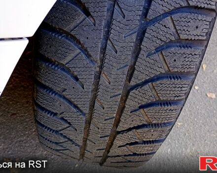 Белый Киа Рио, объемом двигателя 1.1 л и пробегом 250 тыс. км за 4850 $, фото 2 на Automoto.ua