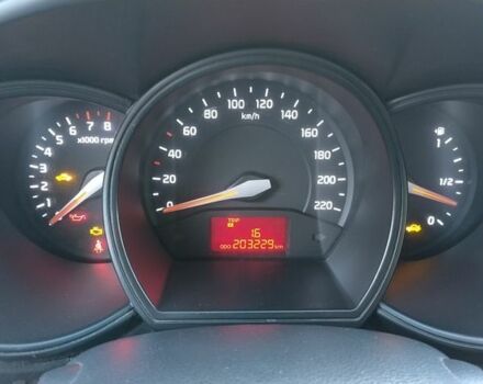 Белый Киа Рио, объемом двигателя 1.2 л и пробегом 203 тыс. км за 5600 $, фото 6 на Automoto.ua