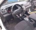Белый Киа Рио, объемом двигателя 1.59 л и пробегом 70 тыс. км за 8900 $, фото 6 на Automoto.ua