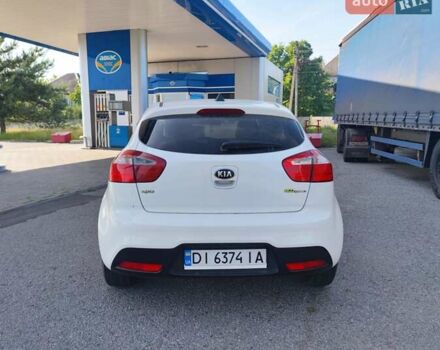 Белый Киа Рио, объемом двигателя 1.4 л и пробегом 282 тыс. км за 7799 $, фото 3 на Automoto.ua