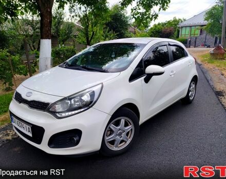 Белый Киа Рио, объемом двигателя 1.4 л и пробегом 282 тыс. км за 6999 $, фото 1 на Automoto.ua
