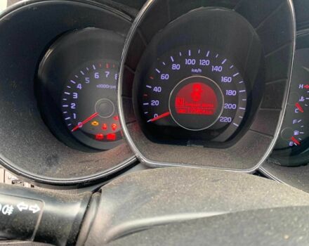 Білий Кіа Ріо, об'ємом двигуна 0 л та пробігом 170 тис. км за 2013 $, фото 5 на Automoto.ua