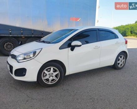 Белый Киа Рио, объемом двигателя 1.4 л и пробегом 282 тыс. км за 7799 $, фото 1 на Automoto.ua
