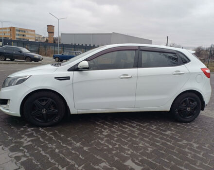 Белый Киа Рио, объемом двигателя 1.6 л и пробегом 201 тыс. км за 7700 $, фото 1 на Automoto.ua