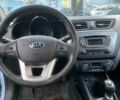 Білий Кіа Ріо, об'ємом двигуна 0 л та пробігом 170 тис. км за 2013 $, фото 4 на Automoto.ua
