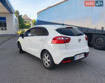 Белый Киа Рио, объемом двигателя 1.4 л и пробегом 282 тыс. км за 7799 $, фото 4 на Automoto.ua