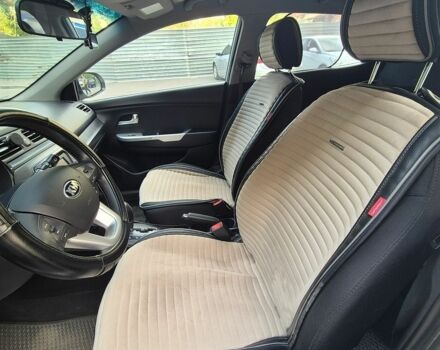 Белый Киа Рио, объемом двигателя 1.4 л и пробегом 82 тыс. км за 8000 $, фото 12 на Automoto.ua