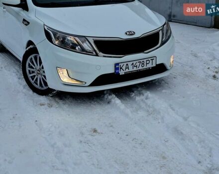 Білий Кіа Ріо, об'ємом двигуна 1.4 л та пробігом 132 тис. км за 8800 $, фото 76 на Automoto.ua