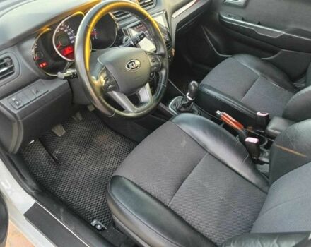 Білий Кіа Ріо, об'ємом двигуна 1.4 л та пробігом 160 тис. км за 8500 $, фото 11 на Automoto.ua