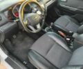 Білий Кіа Ріо, об'ємом двигуна 1.4 л та пробігом 160 тис. км за 8500 $, фото 11 на Automoto.ua