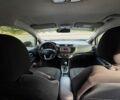 Білий Кіа Ріо, об'ємом двигуна 1.4 л та пробігом 95 тис. км за 8831 $, фото 2 на Automoto.ua