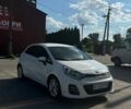Білий Кіа Ріо, об'ємом двигуна 1.4 л та пробігом 117 тис. км за 12500 $, фото 5 на Automoto.ua