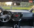 Білий Кіа Ріо, об'ємом двигуна 1.2 л та пробігом 124 тис. км за 8311 $, фото 8 на Automoto.ua
