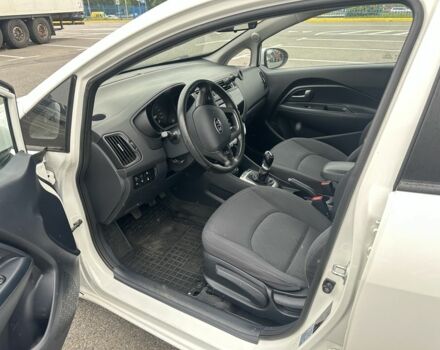 Білий Кіа Ріо, об'ємом двигуна 1.4 л та пробігом 115 тис. км за 7500 $, фото 9 на Automoto.ua