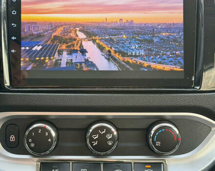 Білий Кіа Ріо, об'ємом двигуна 1.4 л та пробігом 65 тис. км за 12700 $, фото 32 на Automoto.ua